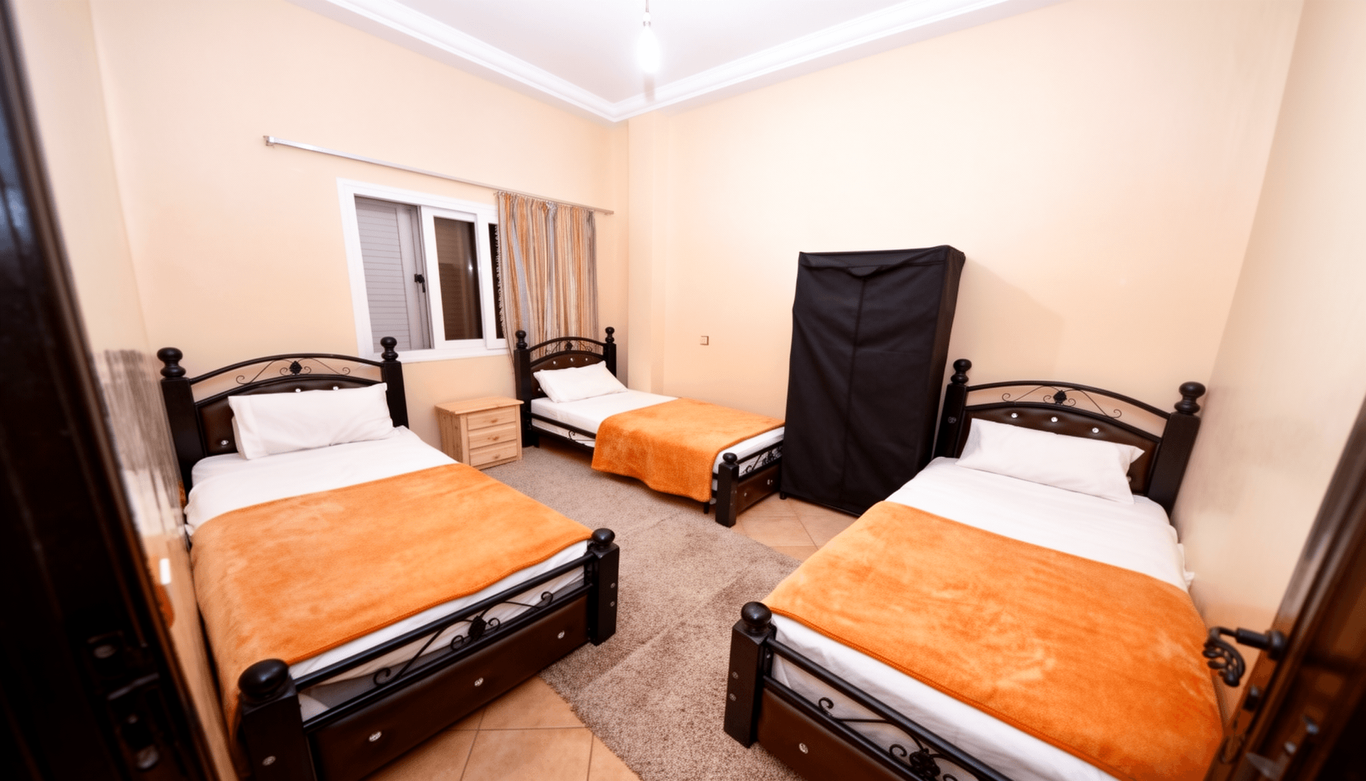 Bedroom furnished with three beds and a wardrobe before AI interior design